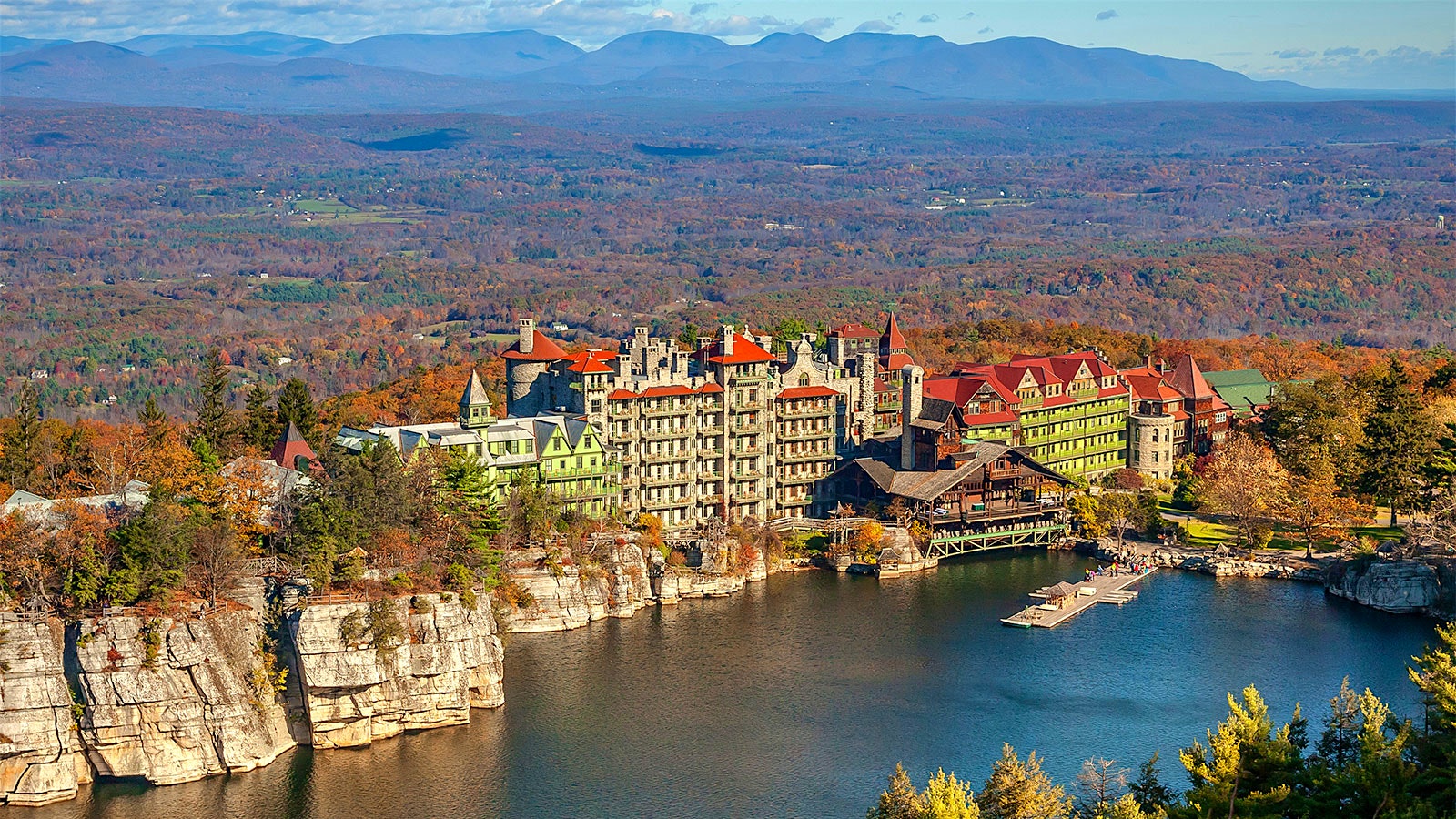 The stone Edwardian exterior of the Mohonk Mountain House during the fall in the Catskill Mountains